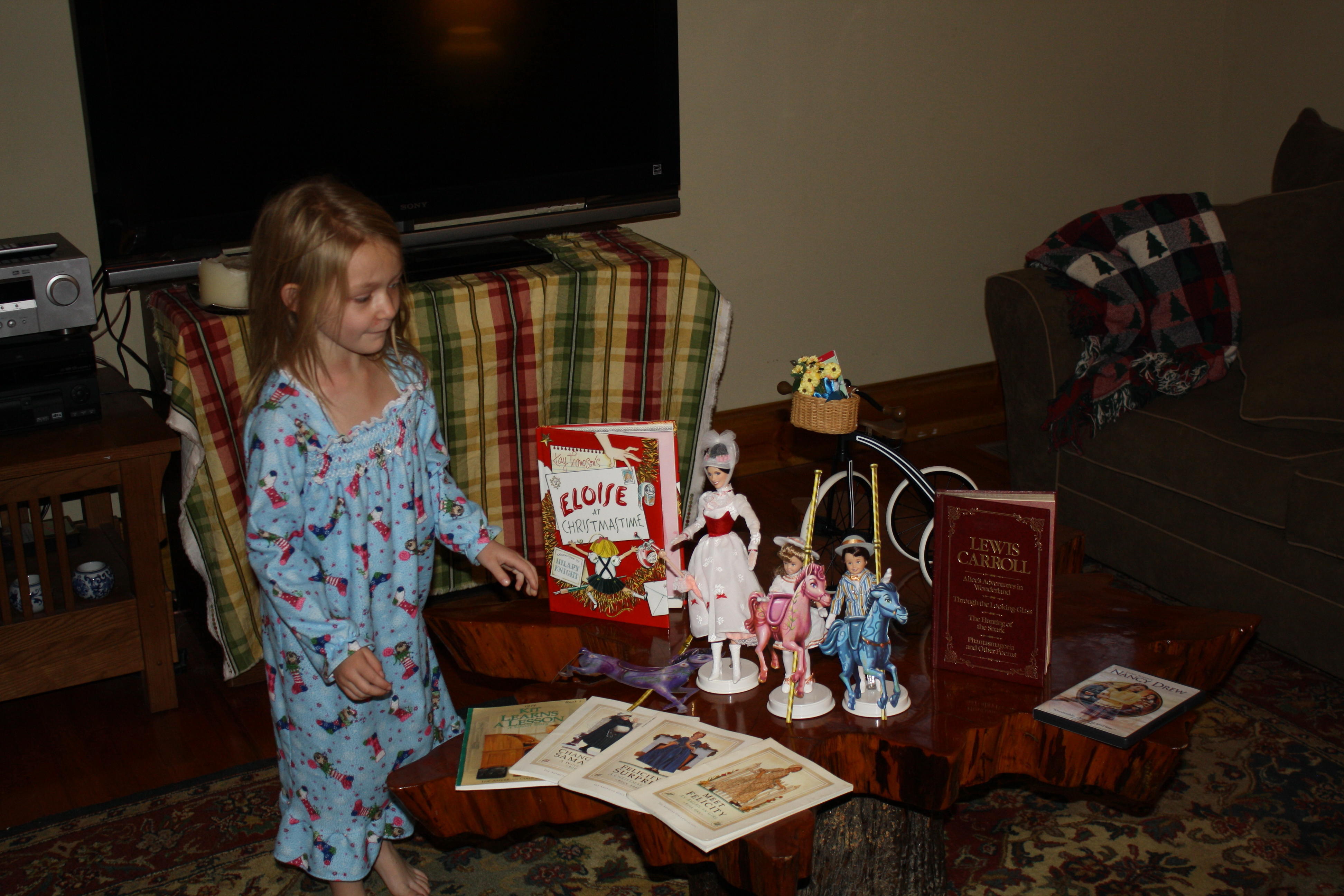 2009_12_25 Cate surveying the bounty from Santa.jpg